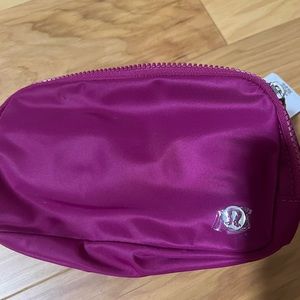 NWT Lululemon Everywhere Belt Bag- rare color. WILD BERRY